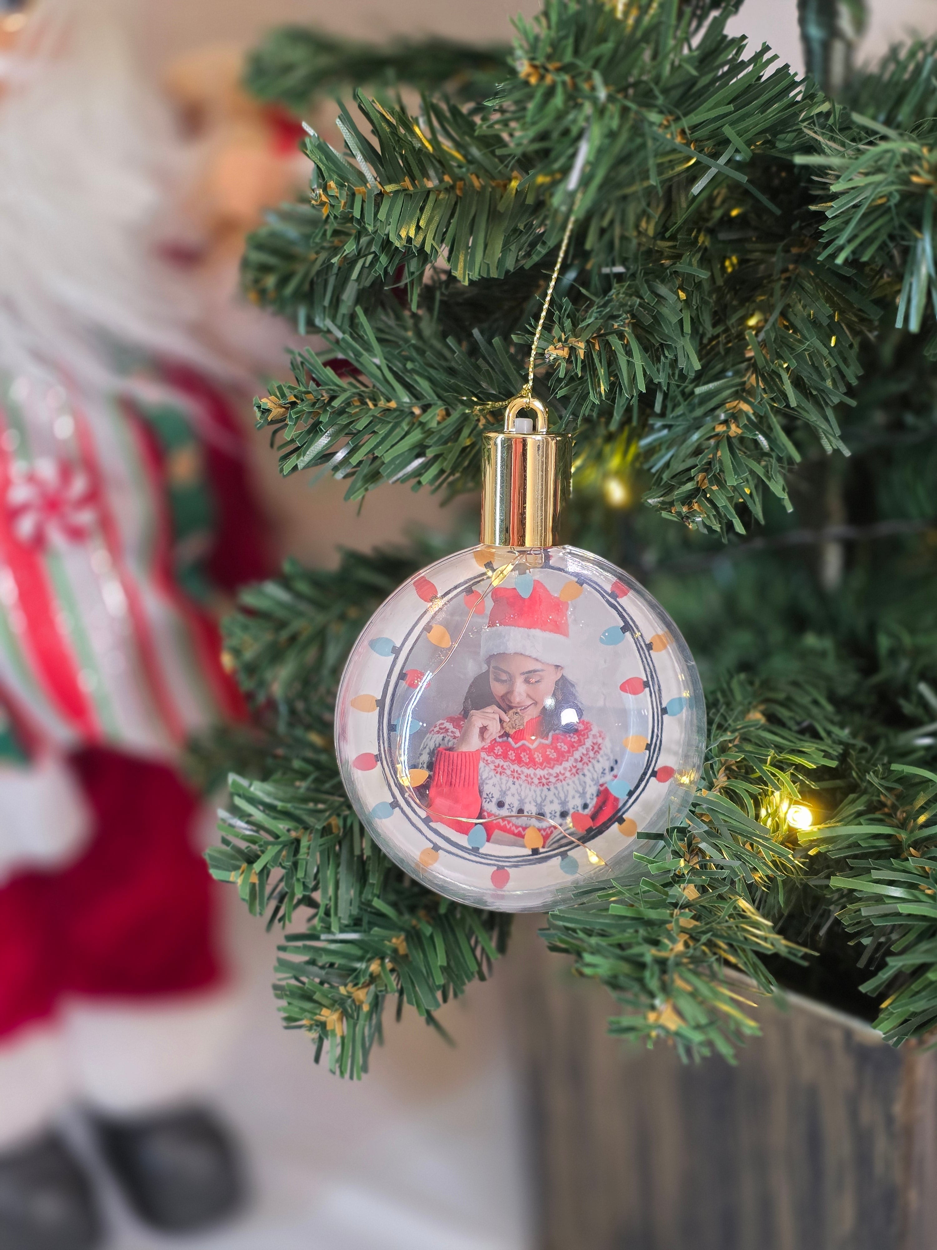 Plastic bauble glowing with warm light