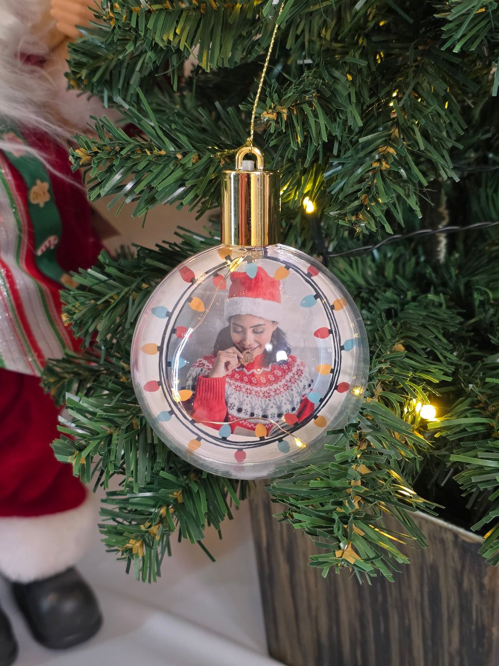 Plastic bauble glowing with warm light