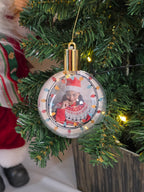 Plastic bauble glowing with warm light