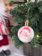 Plastic bauble glowing with warm light