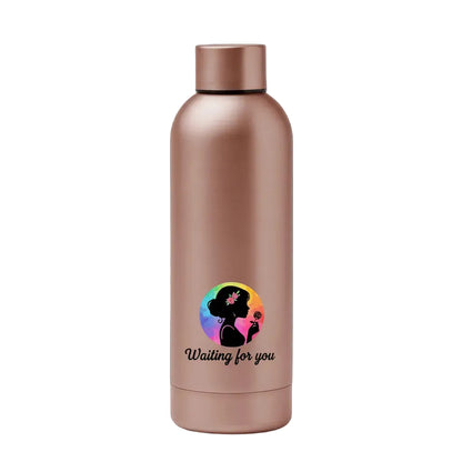 Rose gold water bottle with colorful design and text on a black background